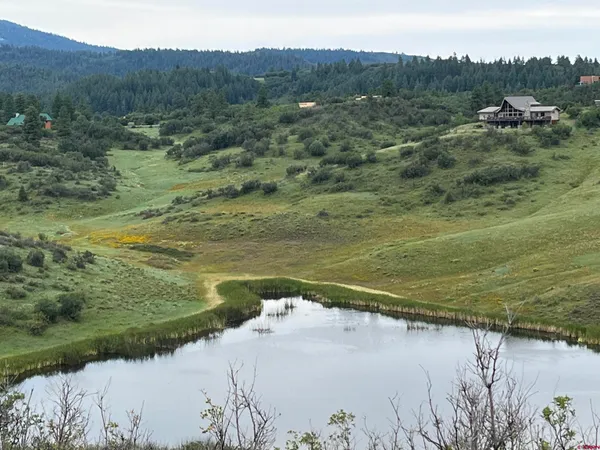 a view of a lake with a mountain view