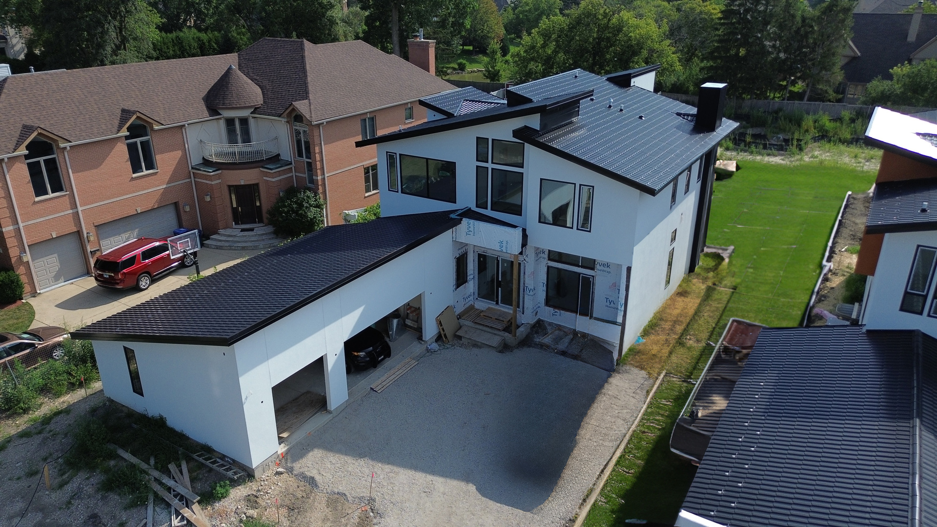 a aerial view of a house with a yard