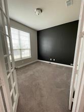 1913 Ridge Creek Lane Aubrey, TX 76227 - Photo 19 of 21 a view of an empty room with a window