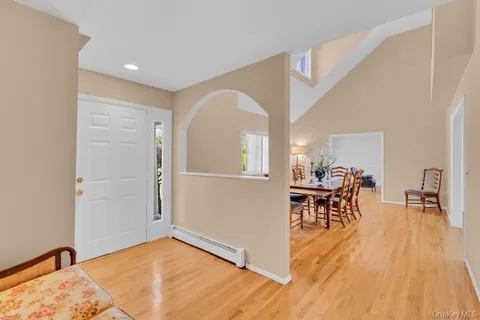 a view of a livingroom with furniture and wooden floor