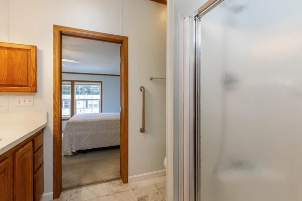 a room that has a bed and a window