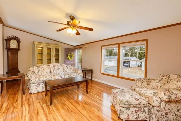 a bedroom with furniture and window