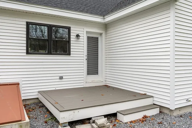 a view of house with a balcony