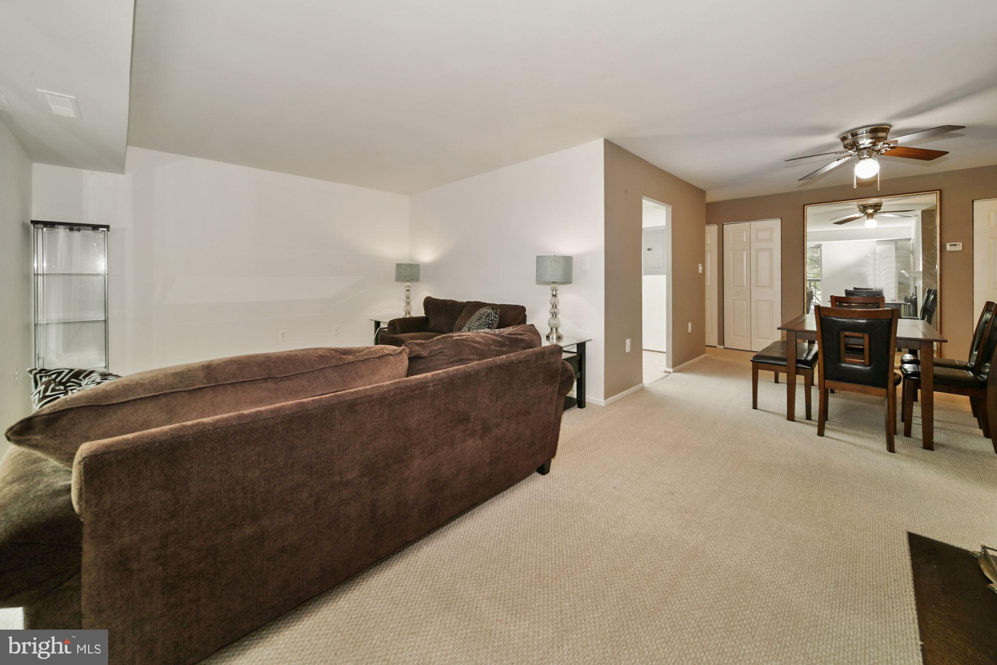 10026 Stedwick Road, Unit 204 Gaithersburg, MD 20886 - Photo 12 of 37 LIVING ROOM/ DINING ROOM VIEW