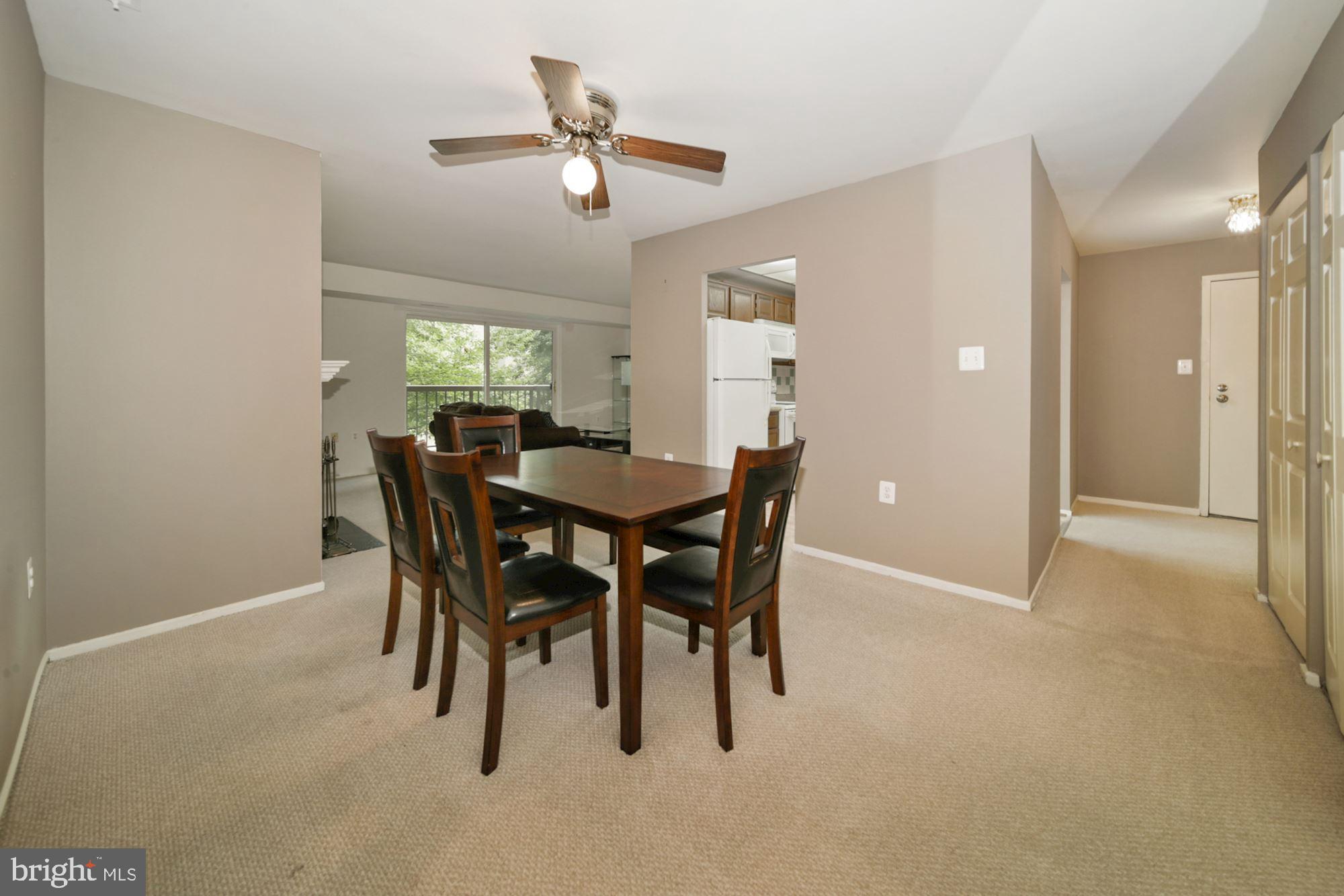 10026 Stedwick Road, Unit 204 Gaithersburg, MD 20886 - Photo 8 of 37 OPEN VIEW S of dining room / foyer & living room