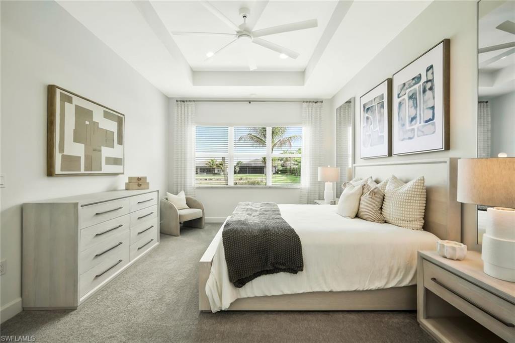 11805 Drake Lane Naples, FL 34120 - Photo 14 of 30 a bedroom with a bed and a window