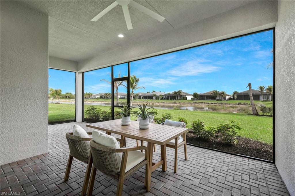 11805 Drake Lane Naples, FL 34120 - Photo 19 of 30 a view of an outdoor space with furniture and garden