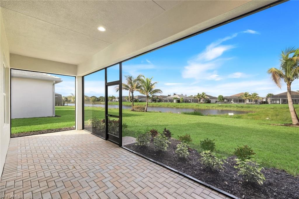 11805 Drake Lane Naples, FL 34120 - Photo 20 of 30 a view of a backyard with garden