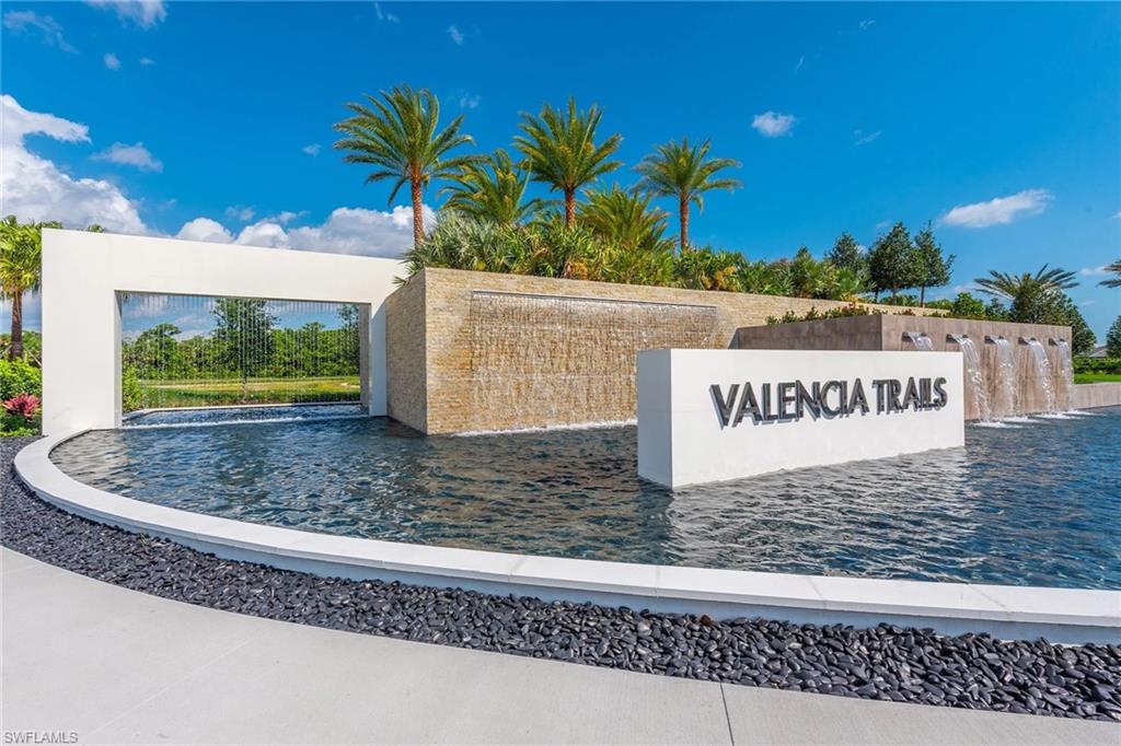 11805 Drake Lane Naples, FL 34120 - Photo 22 of 30 a view of a street with a building in the background