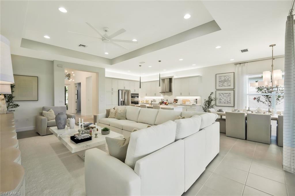 11805 Drake Lane Naples, FL 34120 - Photo 5 of 30 a large room with a lot of white furniture