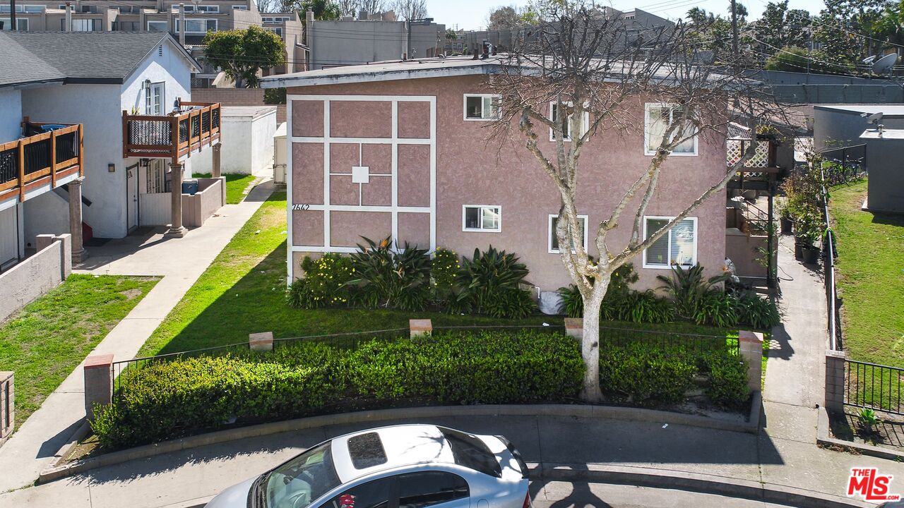 7642 Amberleaf Circle Huntington Beach, CA 92648 - Photo 7 of 9 an aerial view of a house with a garden and plants