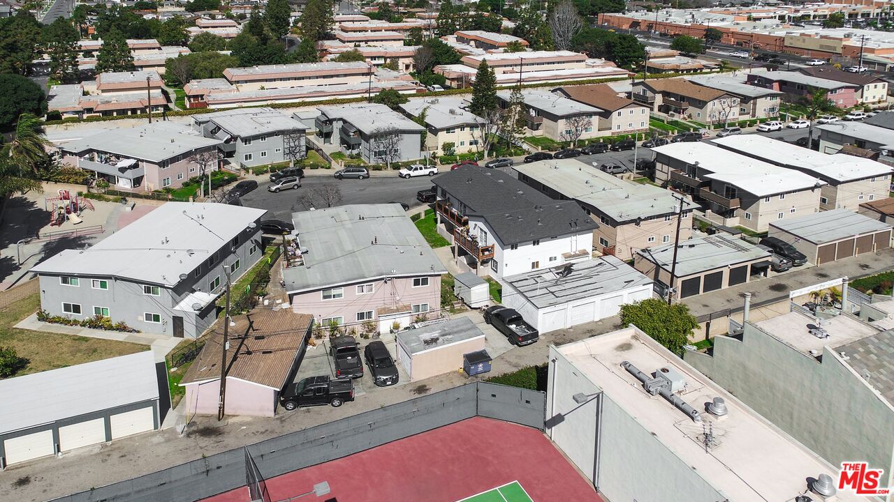 7642 Amberleaf Circle Huntington Beach, CA 92648 - Photo 8 of 9 an aerial view of residential houses with outdoor space