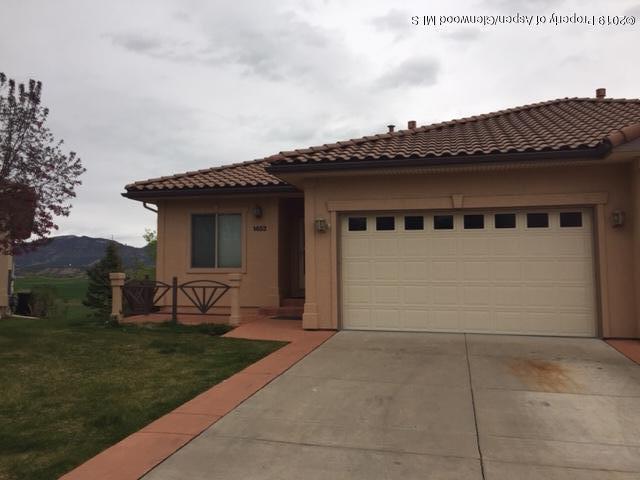 1453 Fir Court Rifle, CO 81650 - Photo 1 of 28 front view of a house with a yard