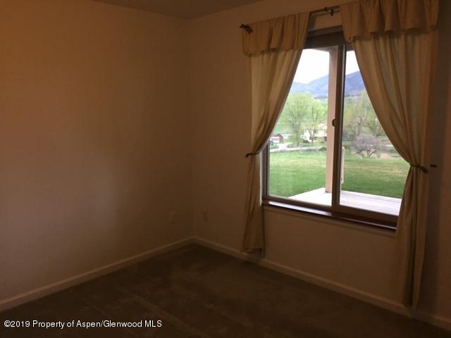 1453 Fir Court Rifle, CO 81650 - Photo 21 of 28 a view of an empty room with a window