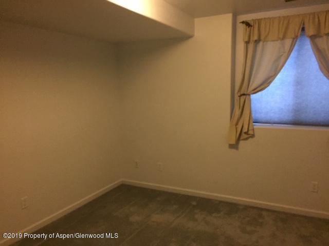 1453 Fir Court Rifle, CO 81650 - Photo 22 of 28 a view of small space with racks on the wall