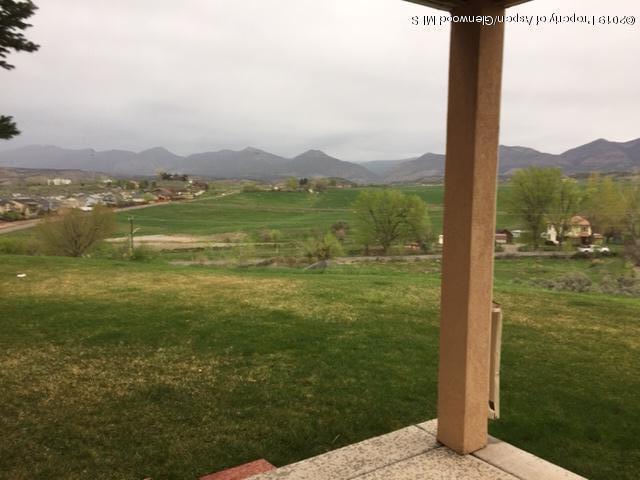 1453 Fir Court Rifle, CO 81650 - Photo 26 of 28 a view of a lake from a yard