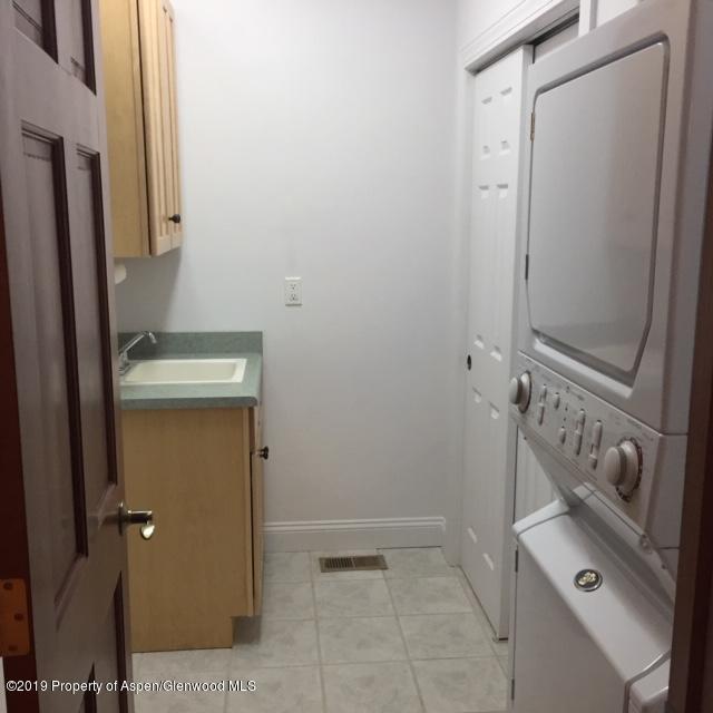 1453 Fir Court Rifle, CO 81650 - Photo 8 of 28 a bathroom with a sink a toilet and shower