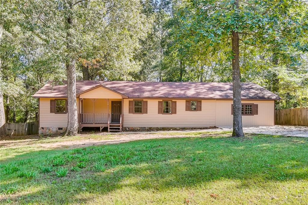 194 Mays Road Stockbridge, GA 30281 - Photo 1 of 1 a front view of a house with a yard and trees