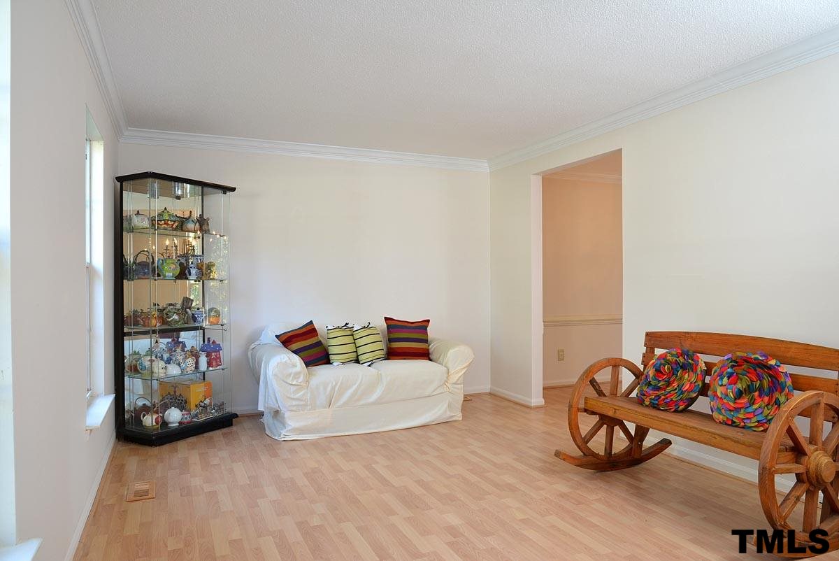 Beautiful laminate hardwood floors to the left as you enter the home.