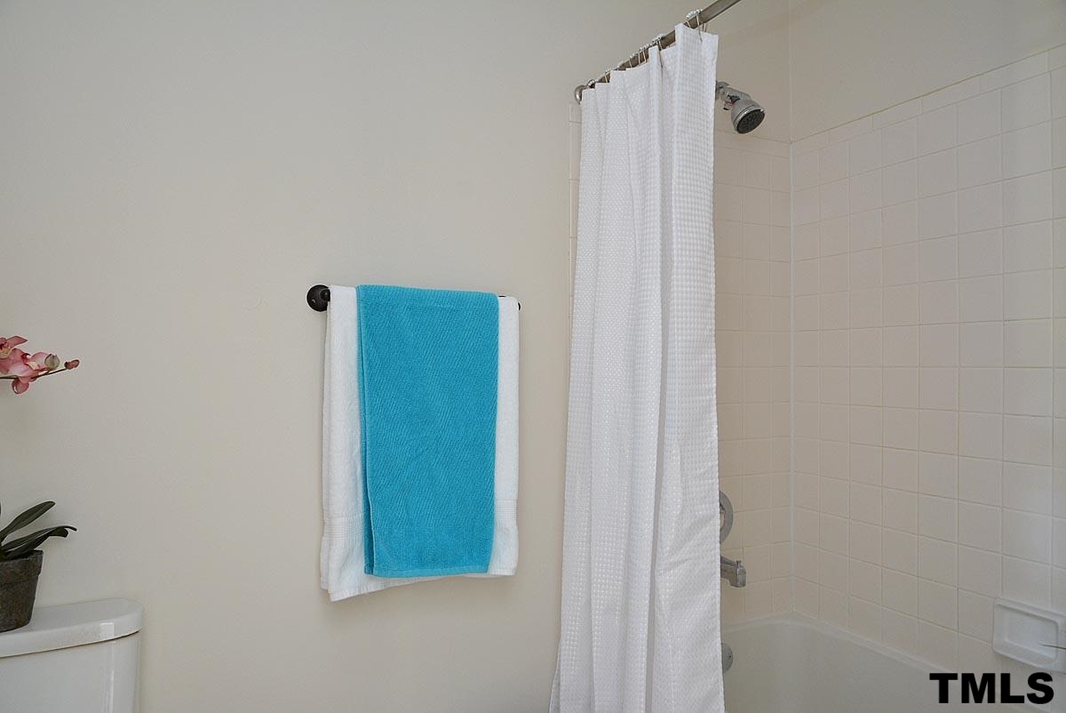 604 Carpenter Fletcher Road Durham, NC 27713 - Photo 19 of 24 Standup shower in the master bathroom.