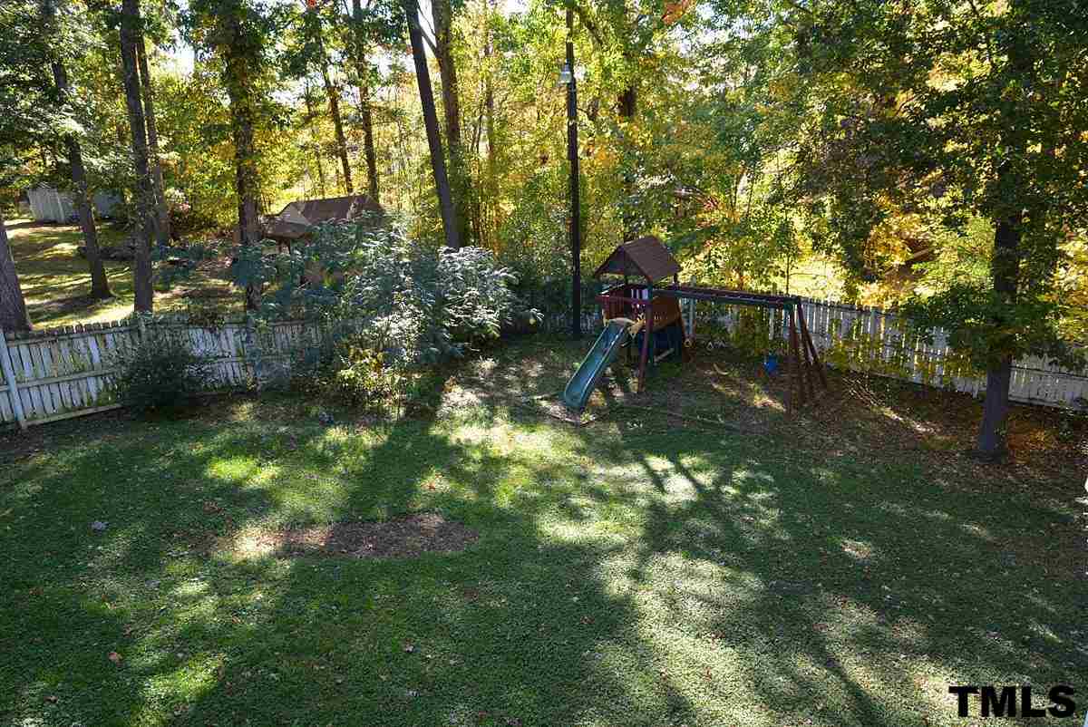 604 Carpenter Fletcher Road Durham, NC 27713 - Photo 23 of 24 Fully fenced and wooded backyard!