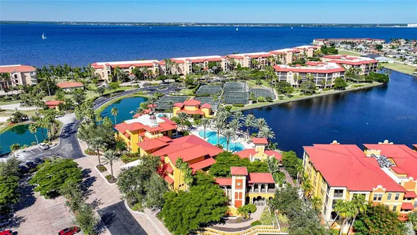 a view of a patio with a table and chairs