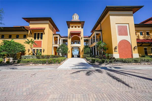 a view of a swimming pool with chairs