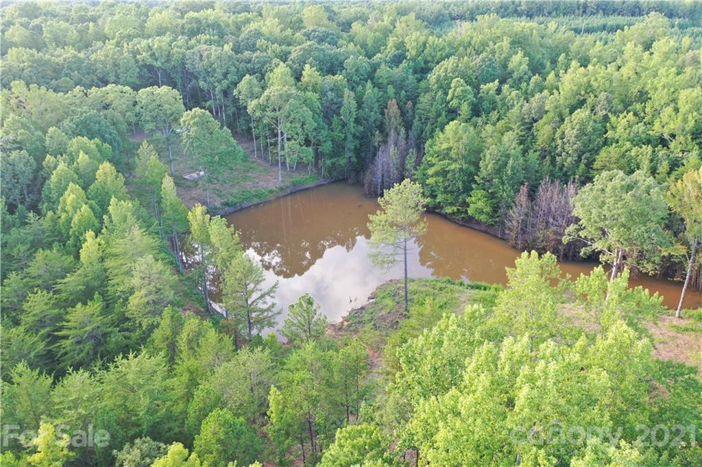 a view of a lake with a house