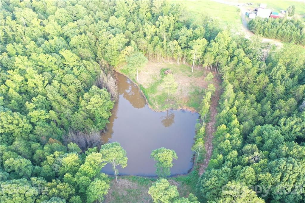 0 J S Dirt Road Clover, SC 29710 - Photo 3 of 13 an aerial view of a house with a yard and garden