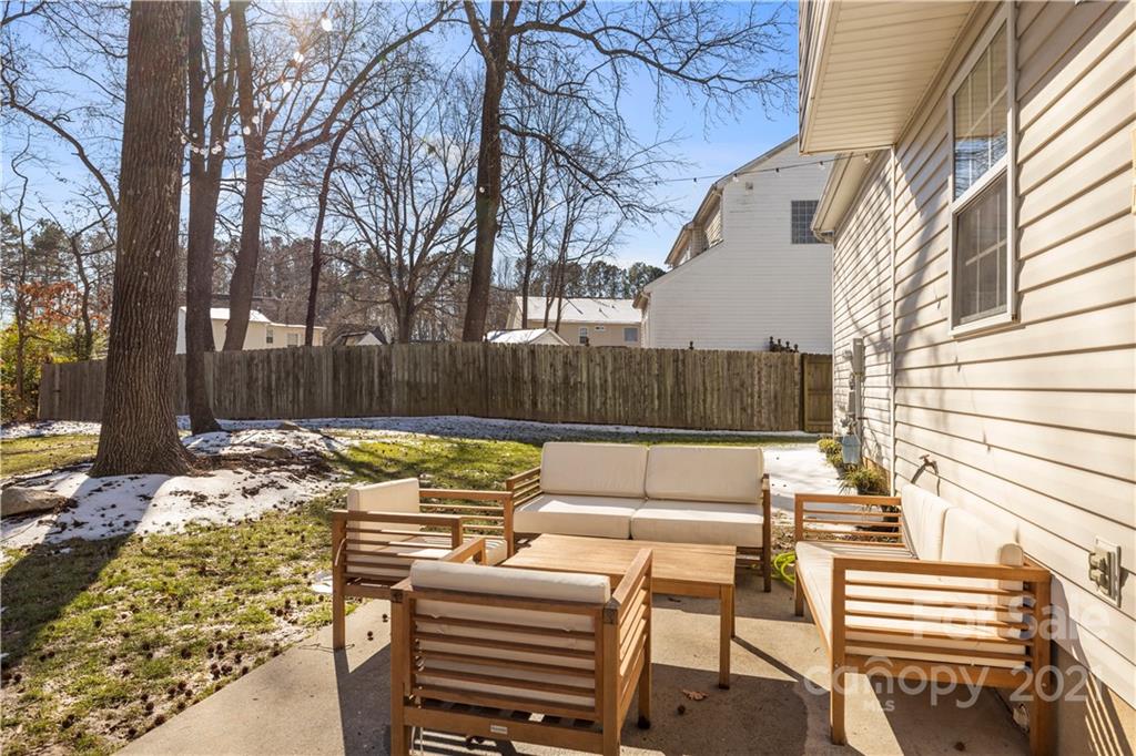 4010 Suttle Place Matthews, NC 28104 - Photo 28 of 31 a view of a patio with a bench