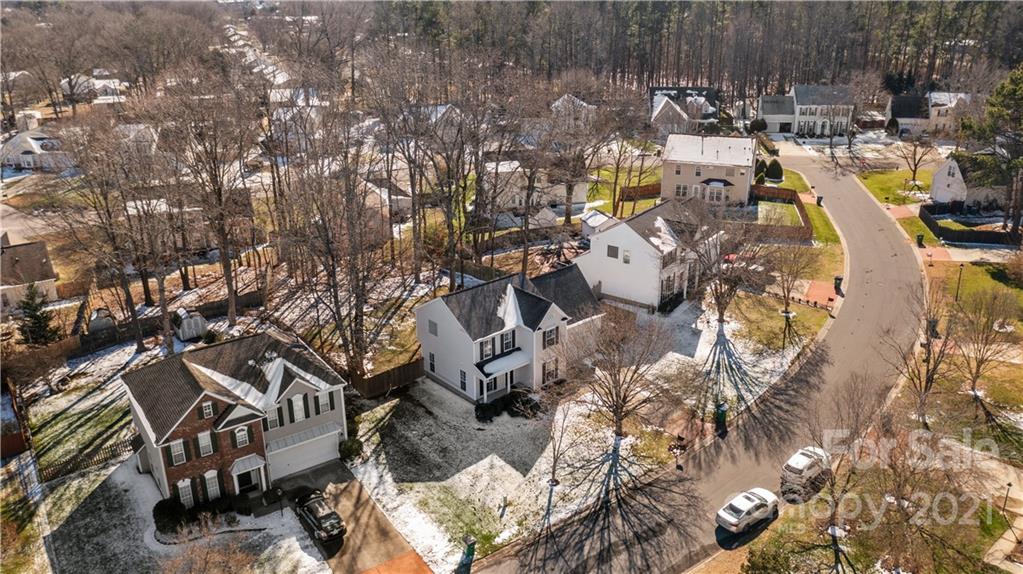 4010 Suttle Place Matthews, NC 28104 - Photo 3 of 31 an aerial view of a residential houses with outdoor space