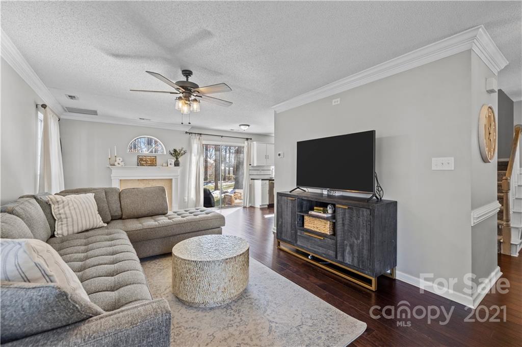 4010 Suttle Place Matthews, NC 28104 - Photo 5 of 31 a living room with furniture and a flat screen tv