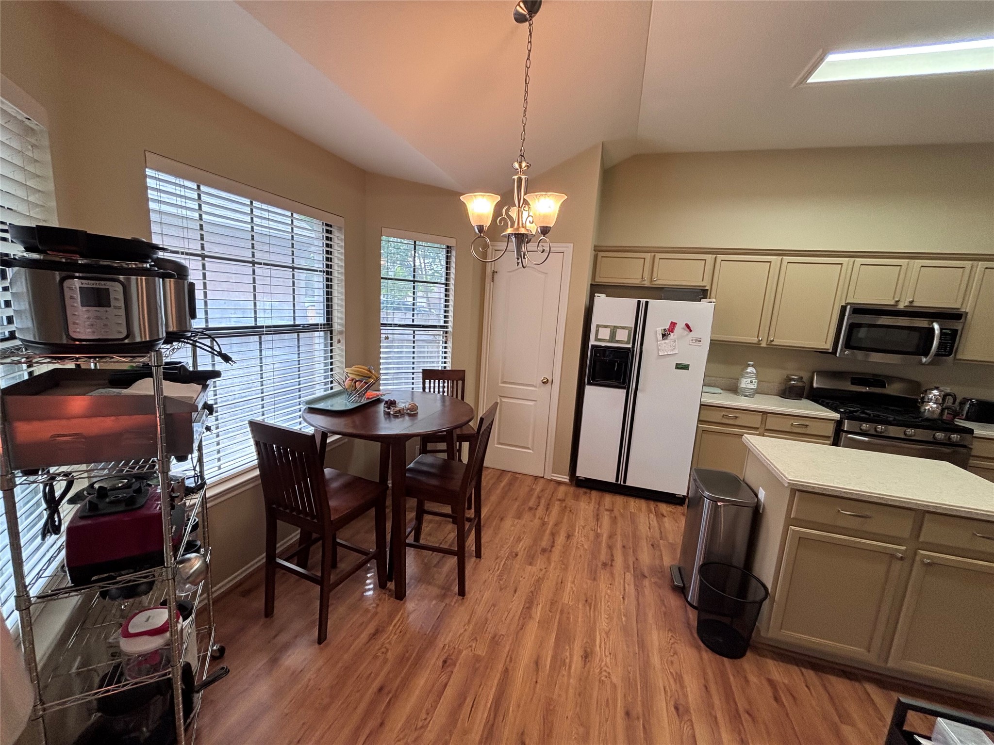 1316 Mesquite Road Cedar Park, TX 78613 - Photo 16 of 24 An inviting kitchen with warm cabinetry and a delightful breakfast nook awaits.
