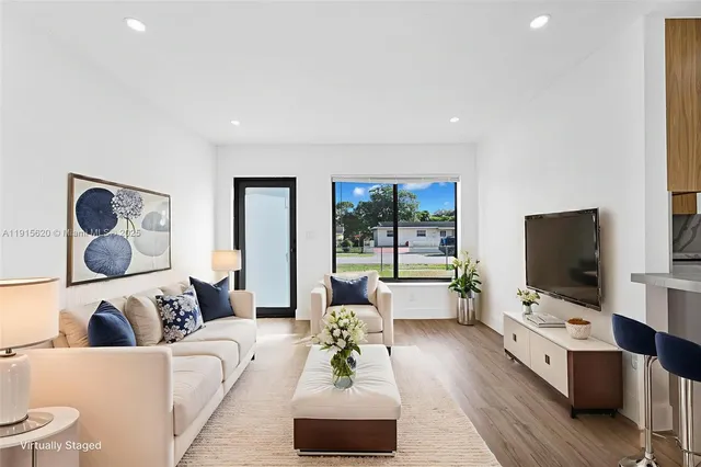 a bathroom with a sink toilet and a mirror