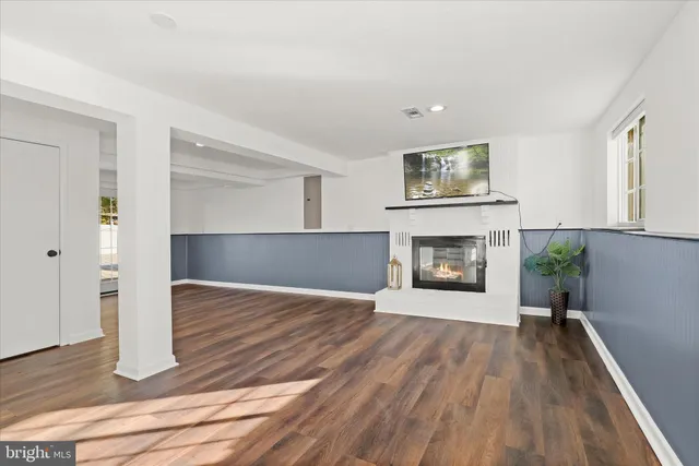 a view of a swimming pool with an outdoor seating