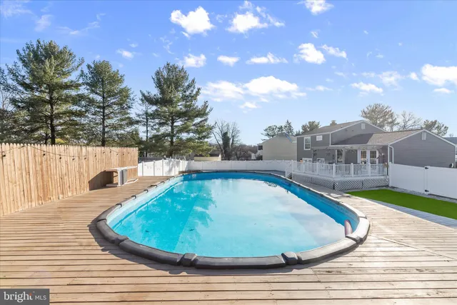 a view of a chairs and tables in the patio