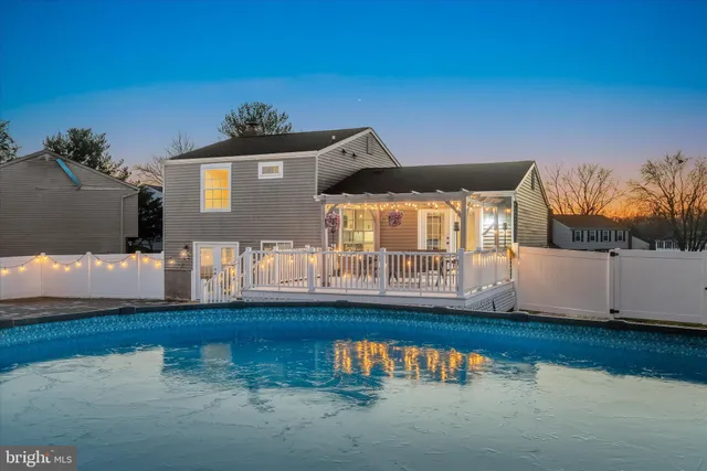 a view of a chairs and table in the patio