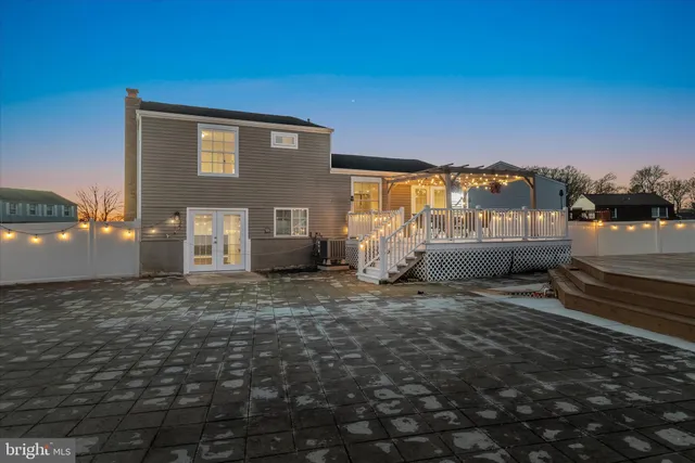 a view of a chairs and table in the patio