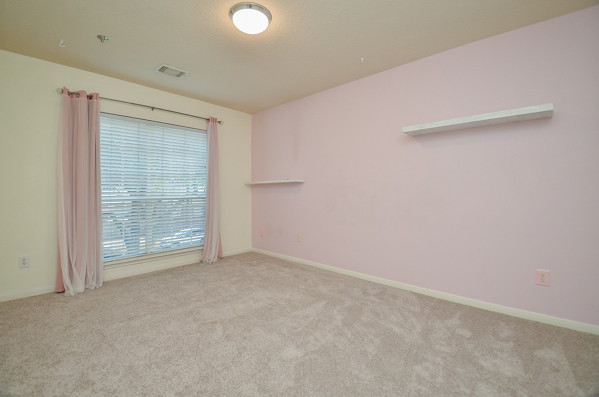 1222 Ragsdale Lane Katy, TX 77494 - Photo 23 of 31 Third bedroom up has a wonderful picture window with views to the majestic oak. New carpeting and spacious.