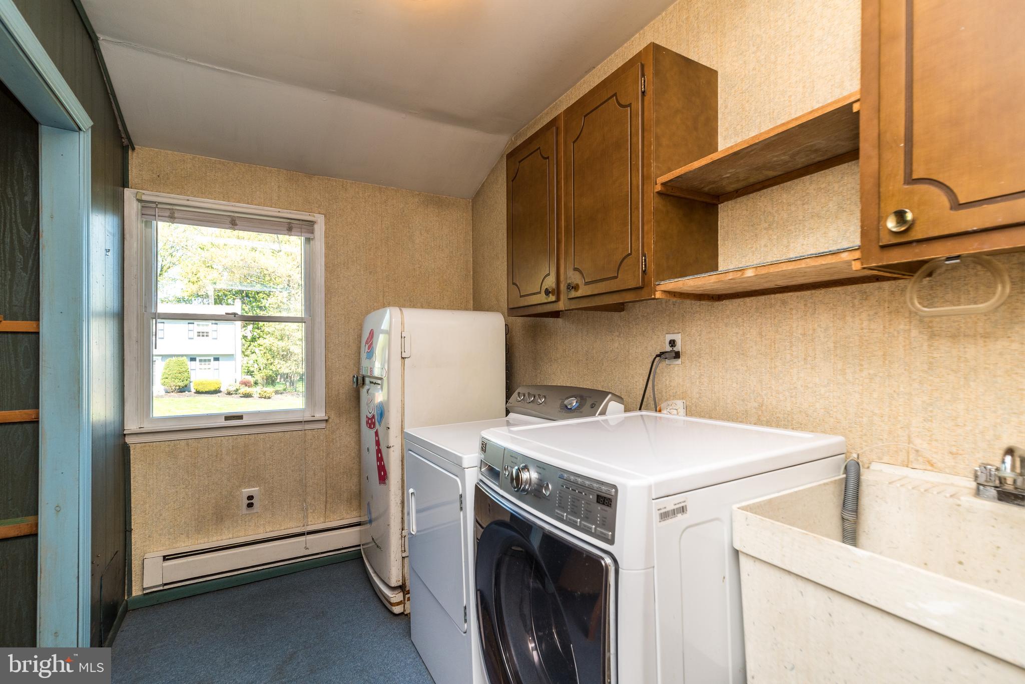 231 Parry Road Warminster, PA 18974 - Photo 50 of 71 First floor laundry w/ 2 walls of storage units