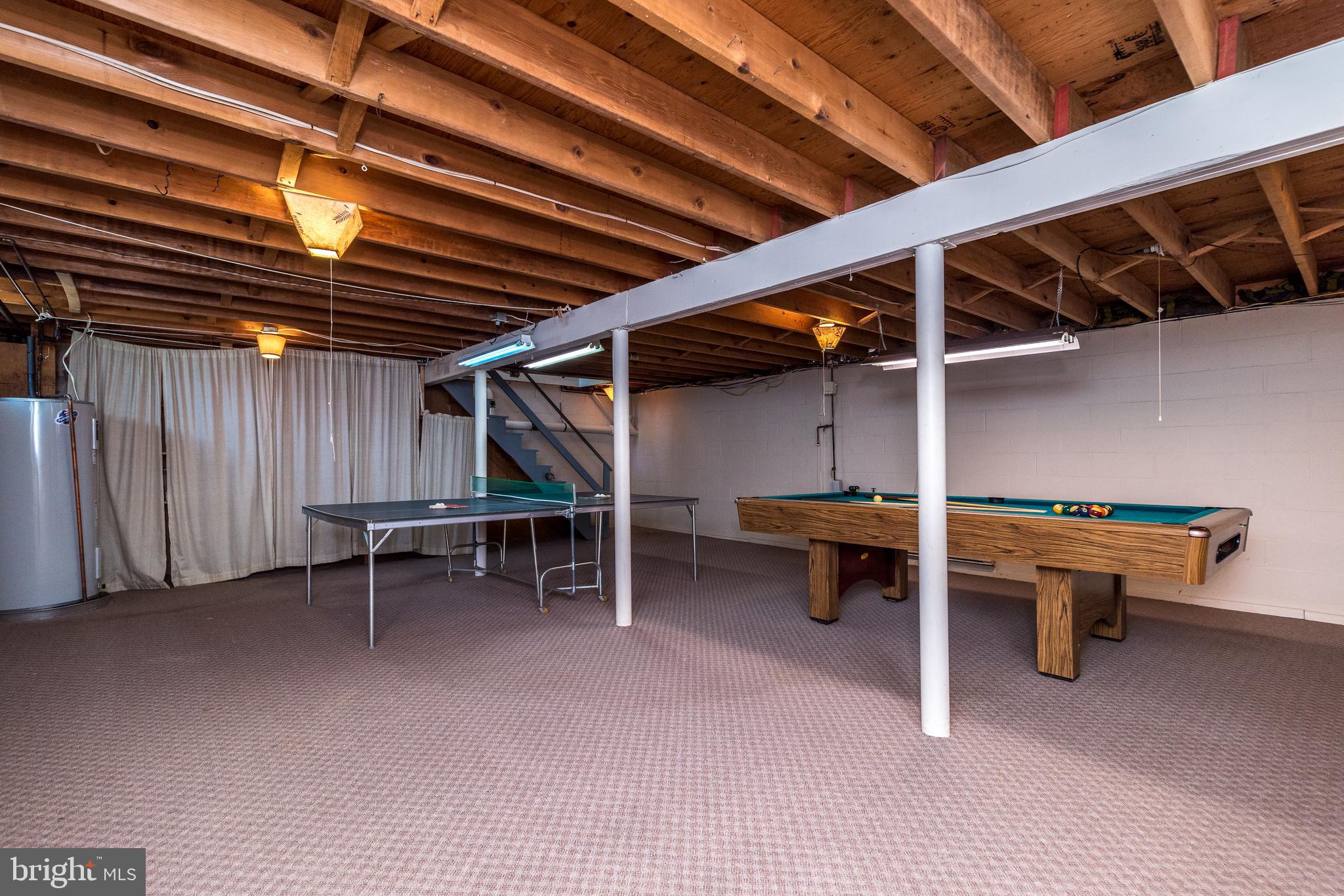231 Parry Road Warminster, PA 18974 - Photo 54 of 71 a view of a room with table and chairs