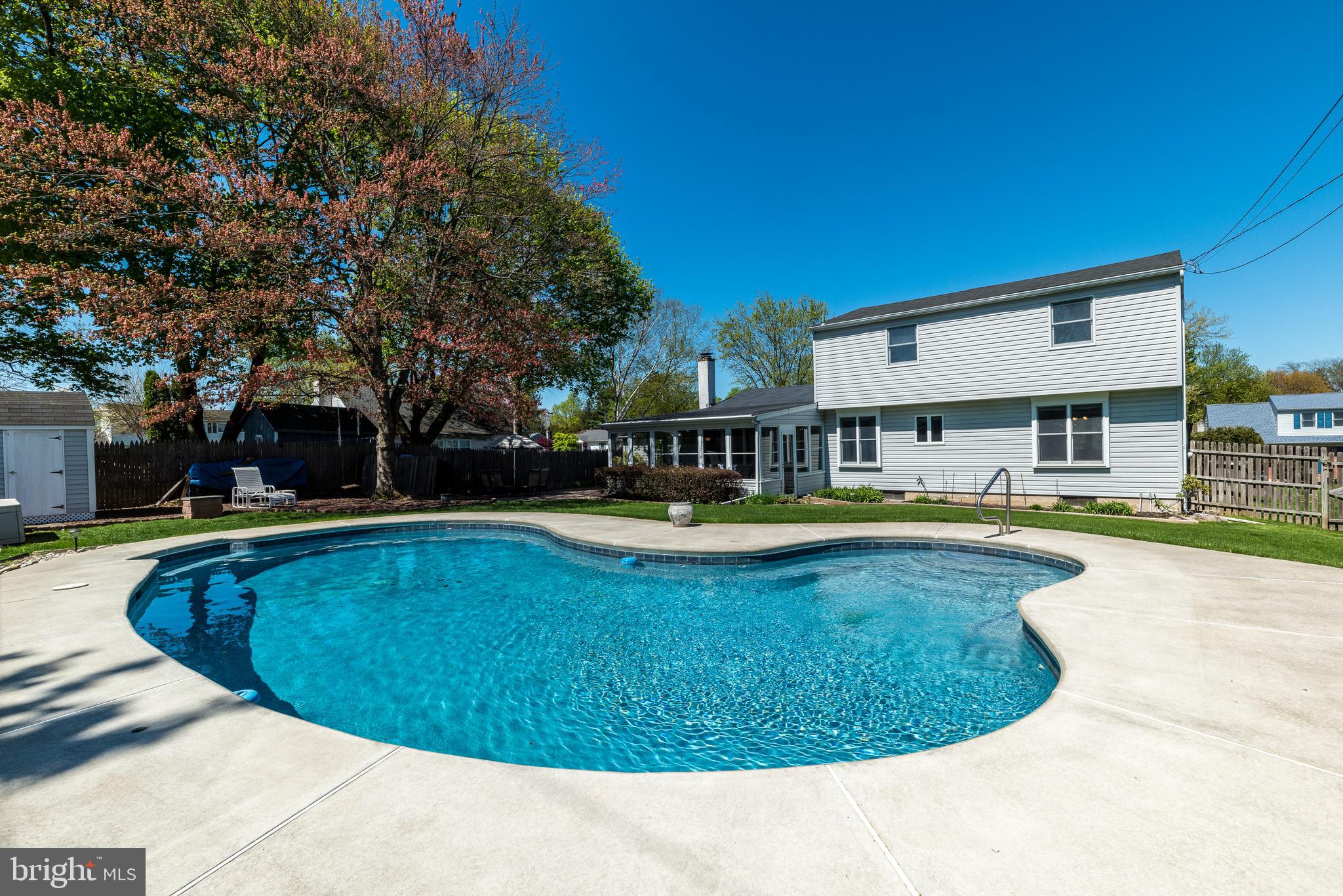 231 Parry Road Warminster, PA 18974 - Photo 62 of 71 a view of a house with swimming pool and sitting area