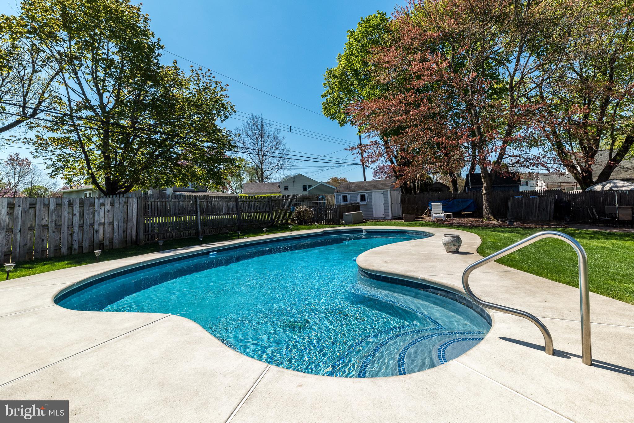 231 Parry Road Warminster, PA 18974 - Photo 63 of 71 a view of a swimming pool with a yard
