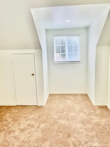 an empty room with a natural light