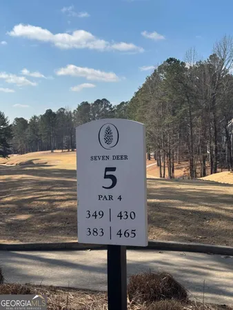 a sign that is on the side of a road