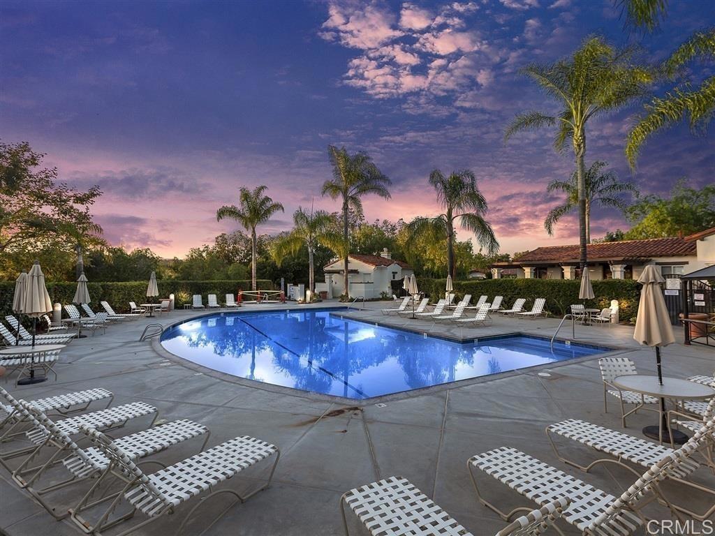 6160 Paseo Tapajos Carlsbad, CA 92009 - Photo 15 of 16 a view of a swimming pool with a lounge chairs