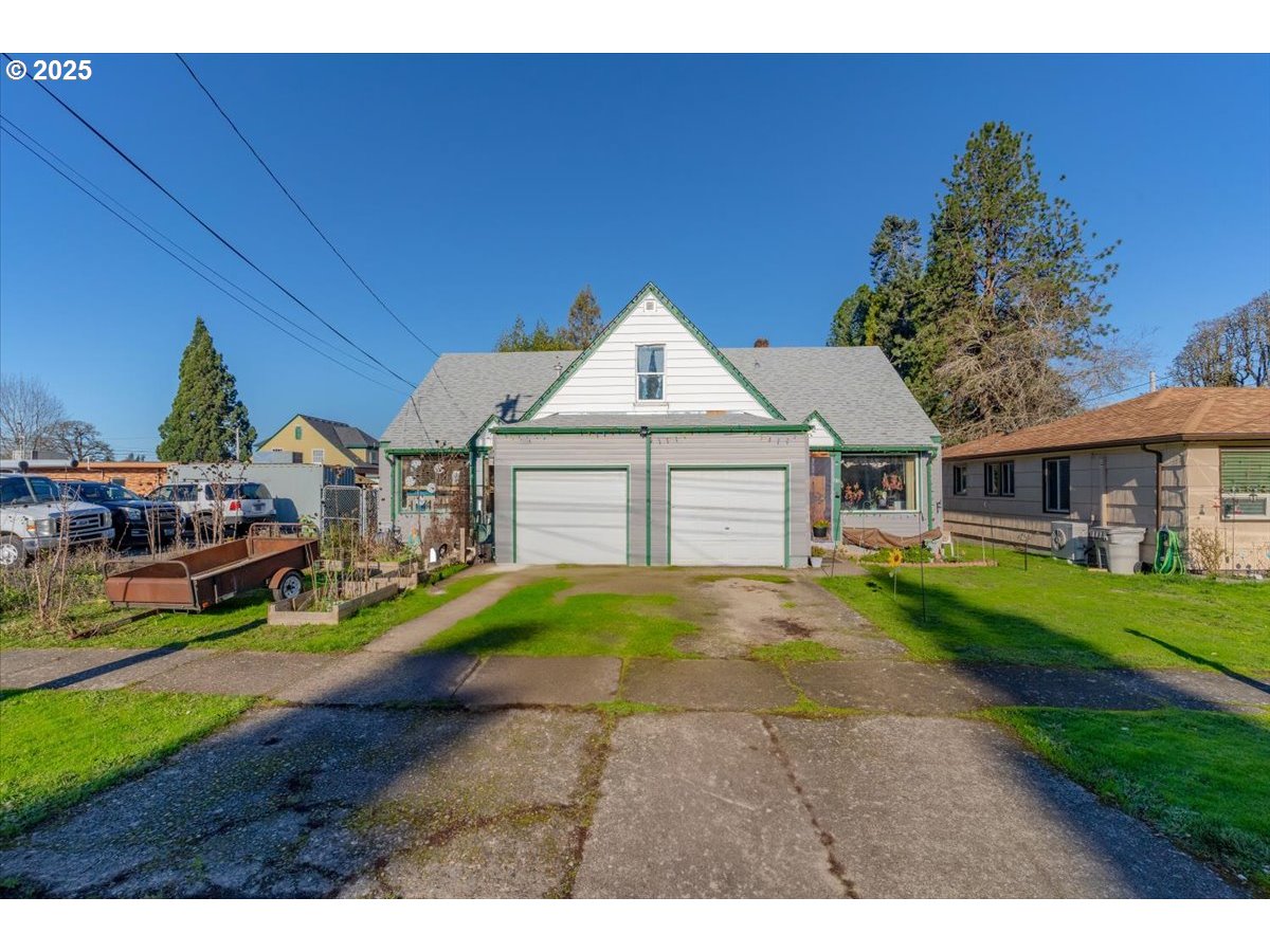 Undisclosed Address Lebanon, OR 97355 - Photo 1 of 34 a front view of a house with a yard and porch