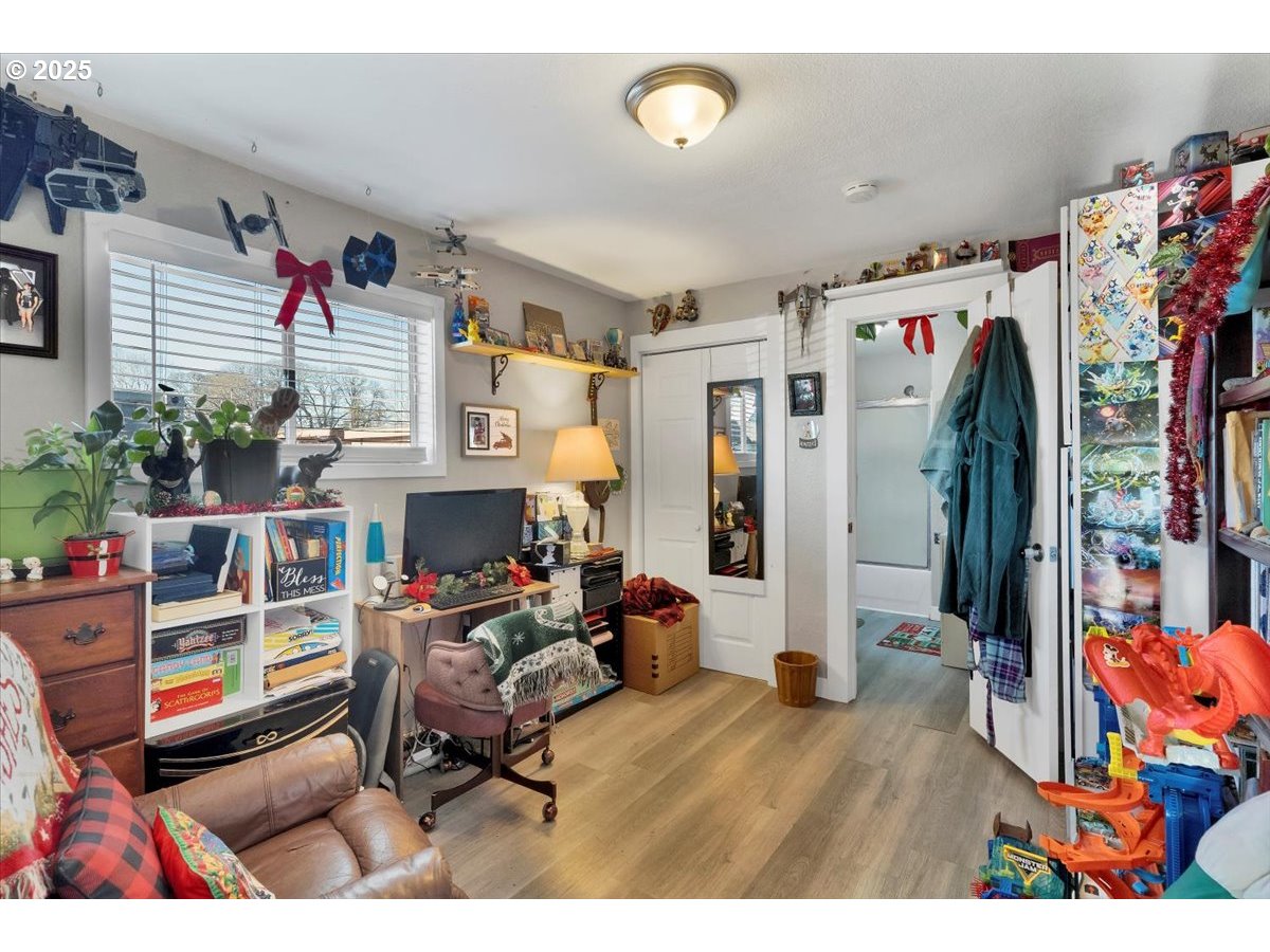 Undisclosed Address Lebanon, OR 97355 - Photo 11 of 34 a living room filled with furniture and a couch