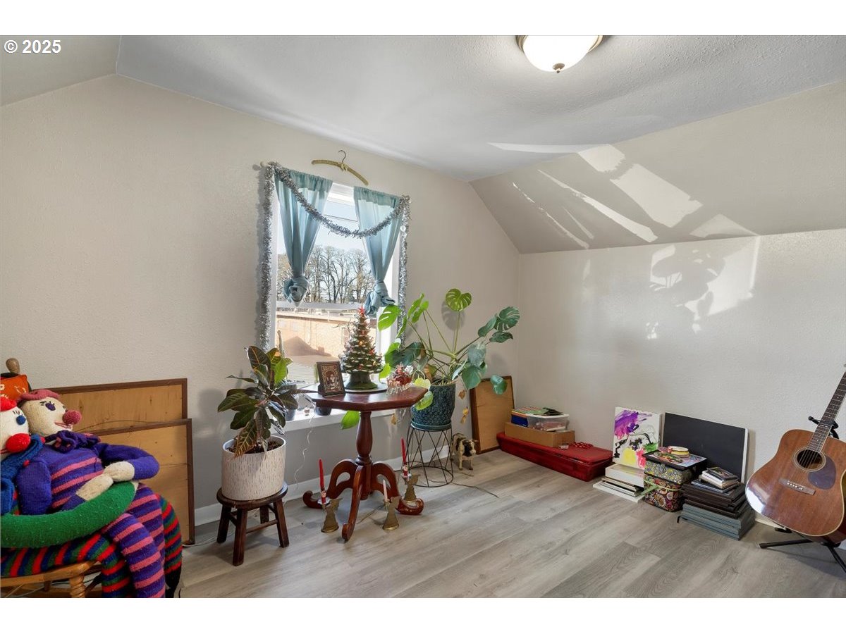 Undisclosed Address Lebanon, OR 97355 - Photo 22 of 34 a living room with furniture and a potted plant