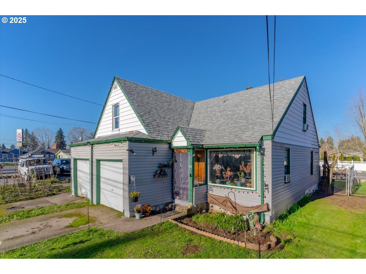 Undisclosed Address Lebanon, OR 97355 - Photo 6 of 34 a view of a house with backyard porch and wooden fence